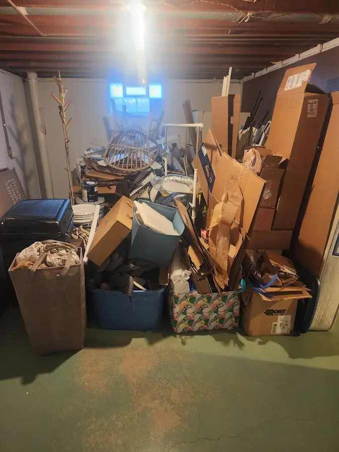 Roll-off dumpster container at job site for 8 Yard Dumpster Rental in Myrtle Creek